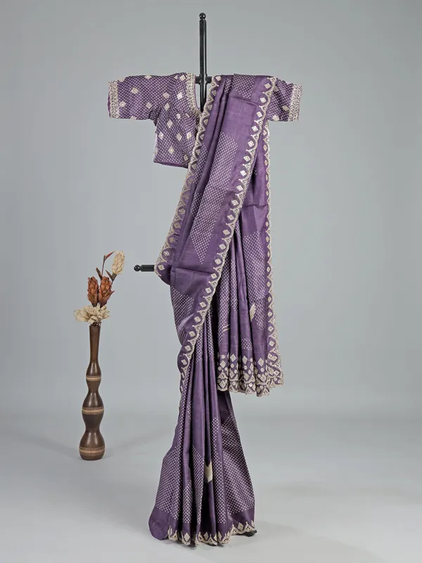 Purple printed silk saree with V neck blouse