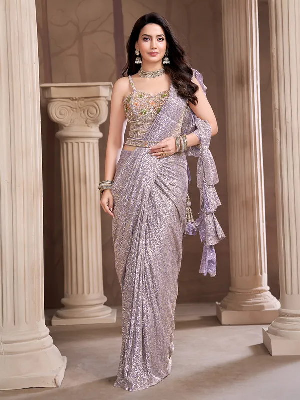 Purple net ready to wear saree with rich embellished blouse