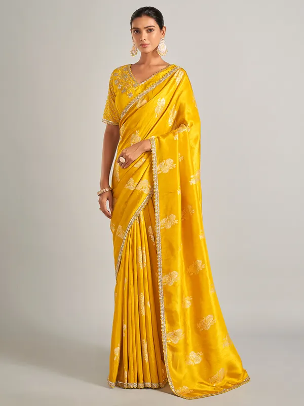Radiant mustard yellow silk saree with zari work