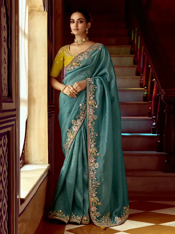 Rama blue tissue silk saree with resham details
