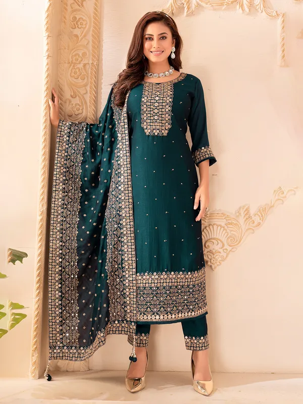 Rama green silk salwar suit with sequins work
