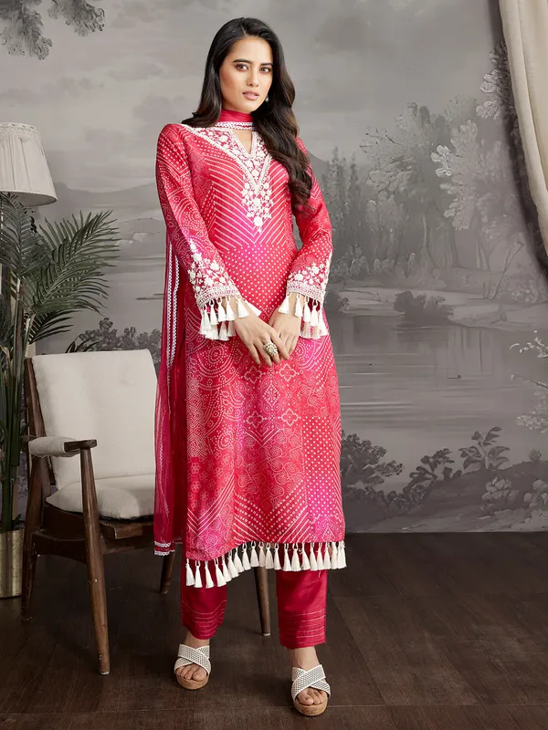 Rani color printed silk salwar suit with dupatta