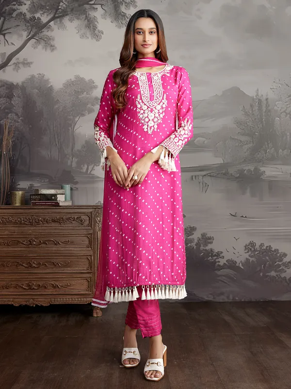 Rani color silk printed salwar suit with dupatta