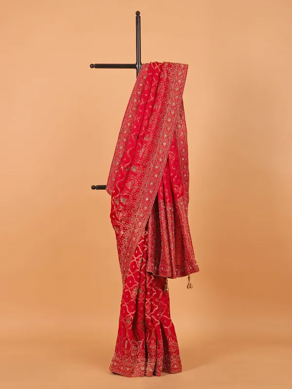 Rani color zari worked wedding saree in dola silk