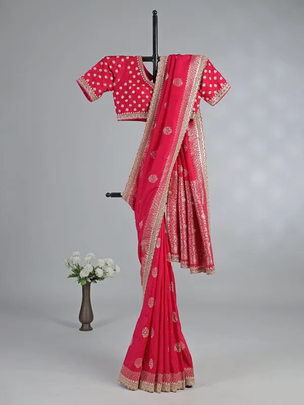 Rani pink dola silk saree with heavily embellished blouse