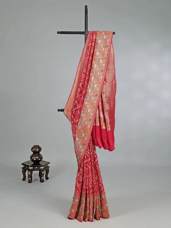 Rani pink georgette saree with colorfull motifs and Print