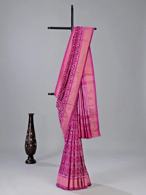 Rani pink patola silk saree with vibrant prints