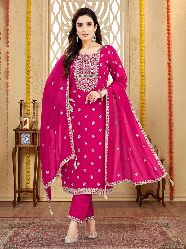Rani pink silk salwar suit with resham elegance