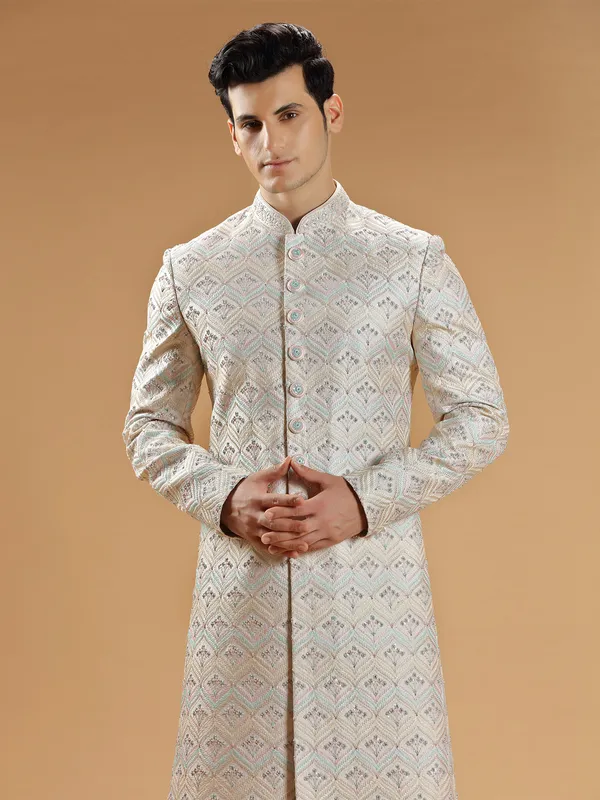 Raw silk cream sherwani for wedding