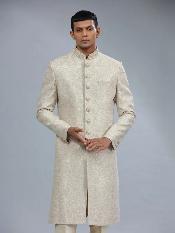 Raw silk cream sherwani with jacquard prints