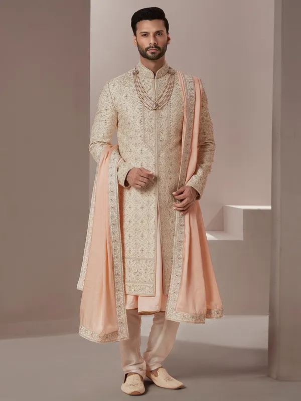 Raw silk fabric peach hue sherwani for groom