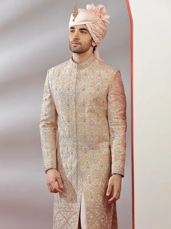 Raw silk groom wear sherwani in peach color