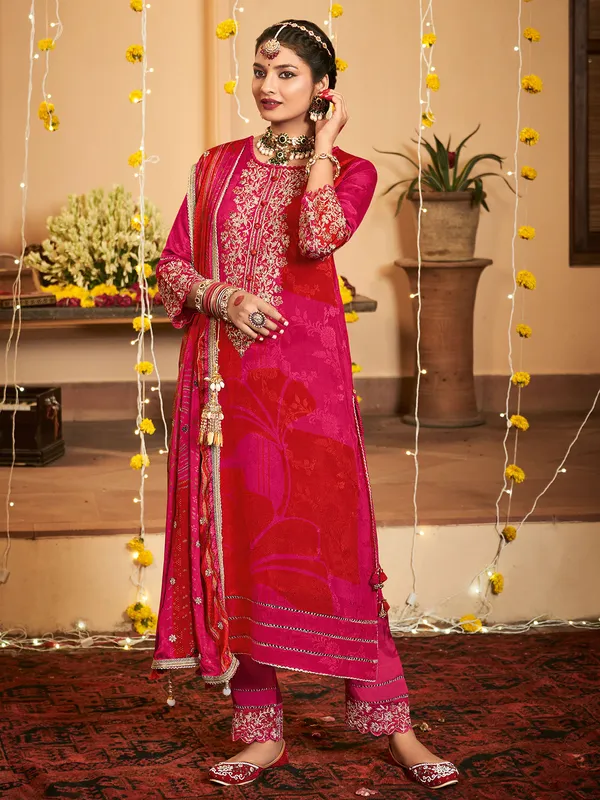Red and pink silk printed salwar suit
