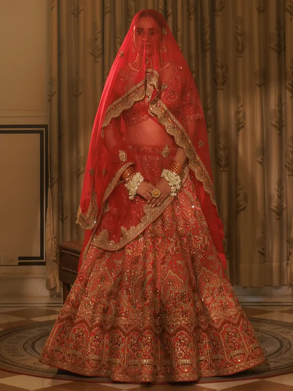 Red bridal silk lehenga choli with thread work
