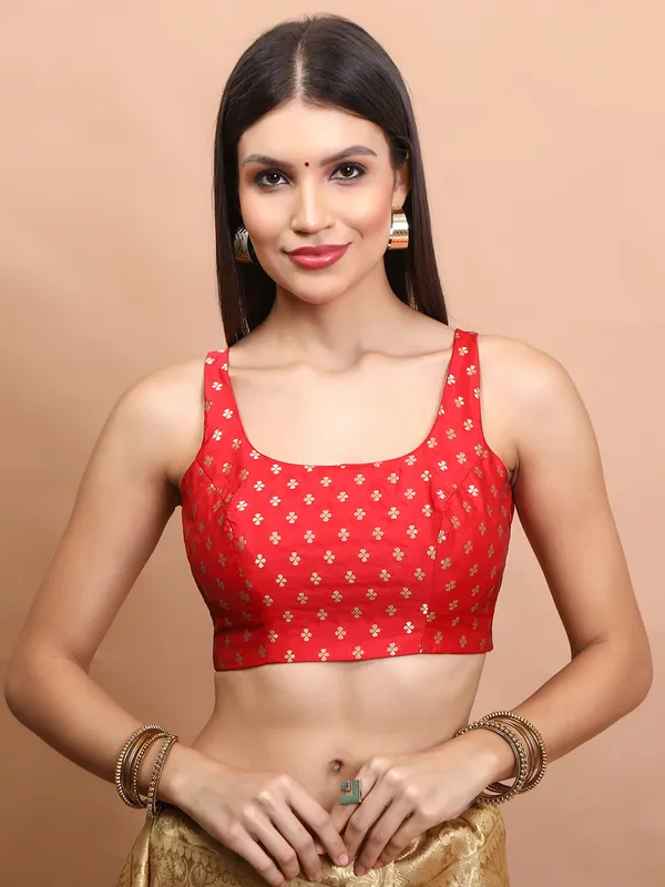 Red brocade sleeveless zari weaving blouse