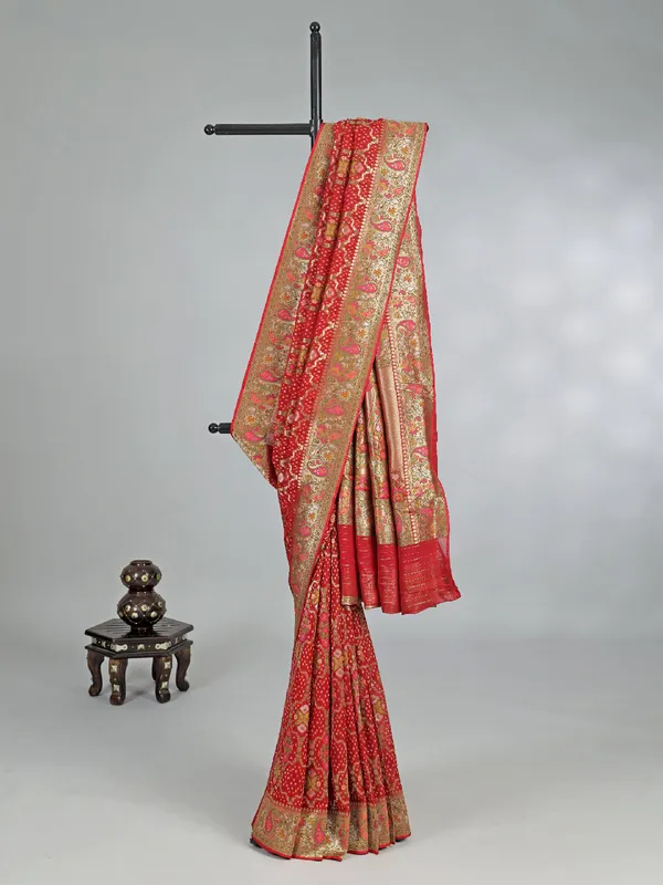 Red georgette saree with colorfull motifs and print