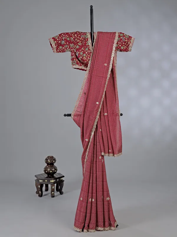 Red muslin silk printed saree with gota accents