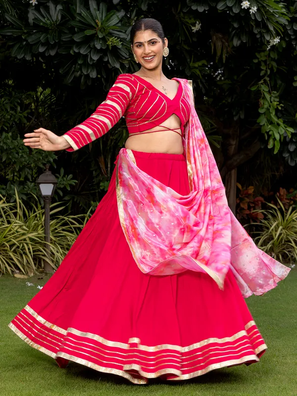 Red navratri silk lehenga choli with gota work
