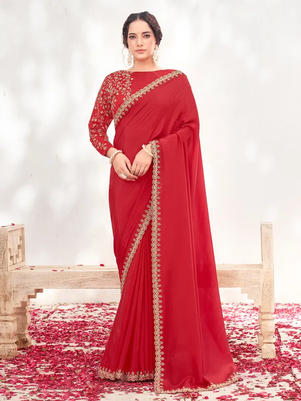 Red party saree in satin with hand work