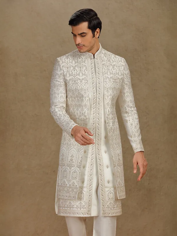 Regal cream silk sherwani with embroidery accents