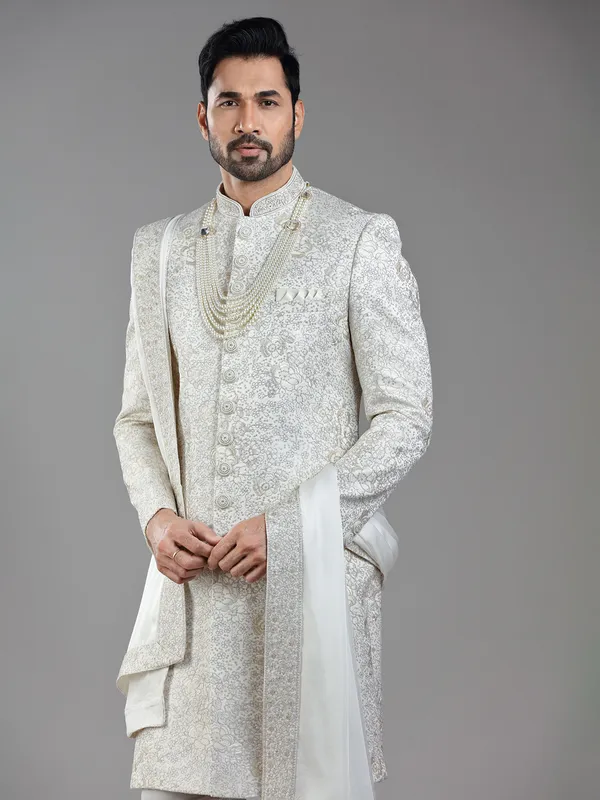 Regal grace in cream silk with ornate resham and sequins detailing