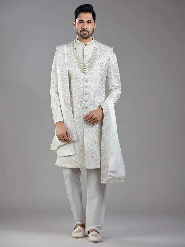 Regal grace in cream silk with ornate resham and sequins detailing
