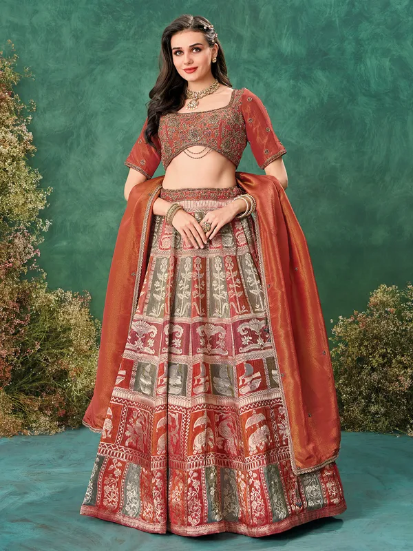 Rust orange tissue silk lehenga choli for wedding wear