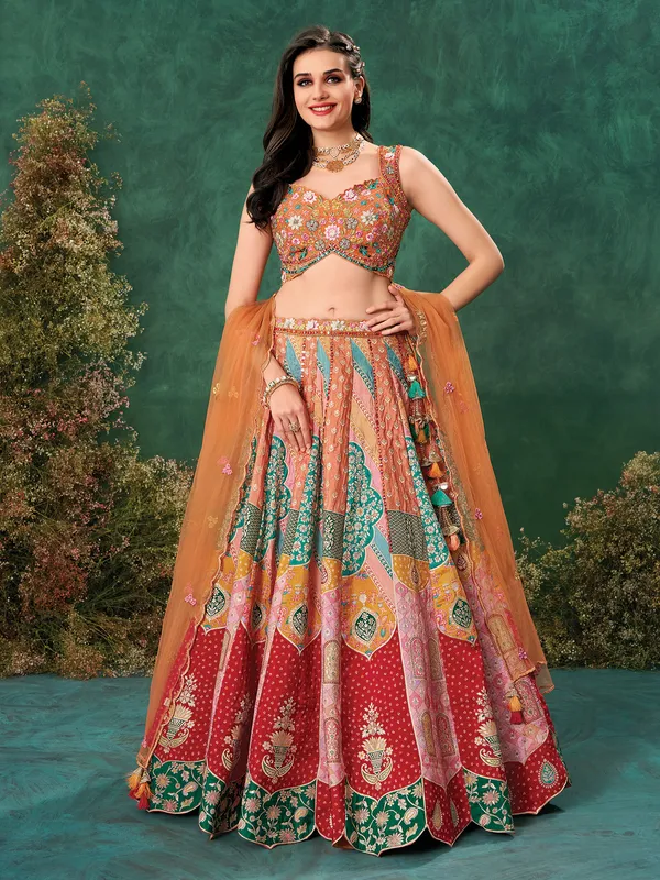 Rust orange wedding wear raw silk lehenga choli