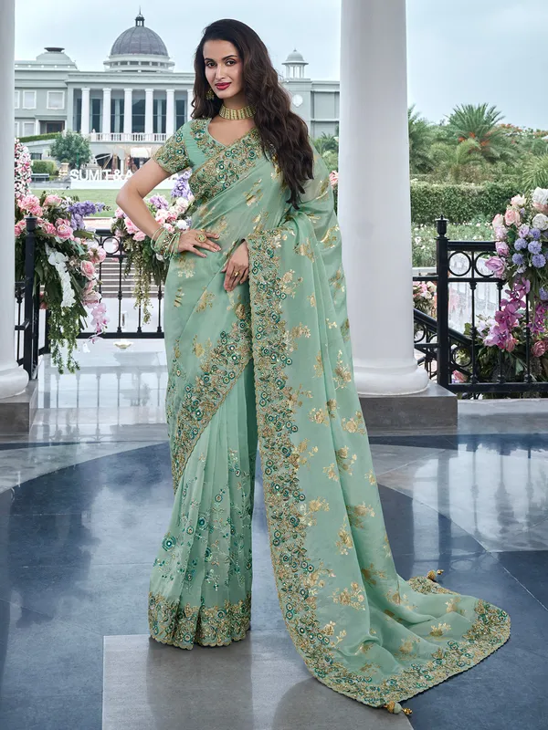 Sage green tissue silk saree for festive