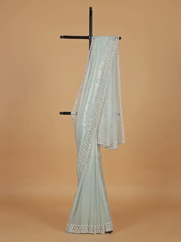 Sequin worked mint green organza saree