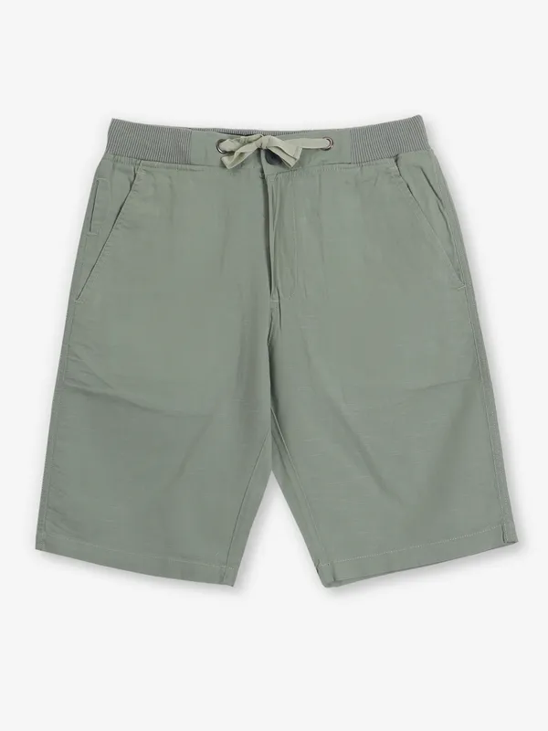 SHIELD pista green cotton shorts