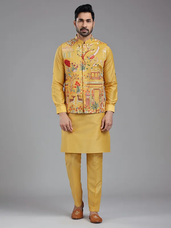 Shiny yellow multi coloured embroiderired kurta jacket set