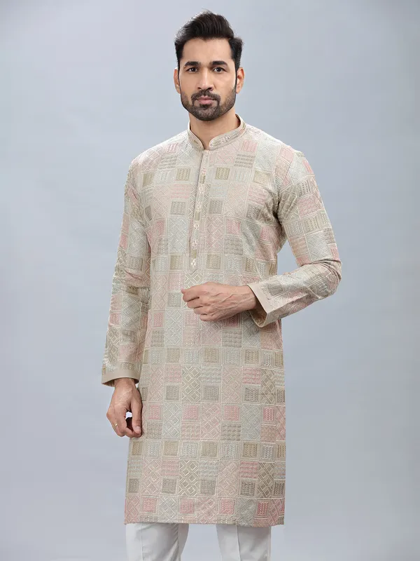Silk based beige festive style kurta set for men