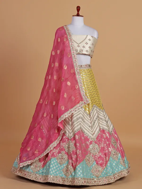 Silk based wedding style cream lehenga choli