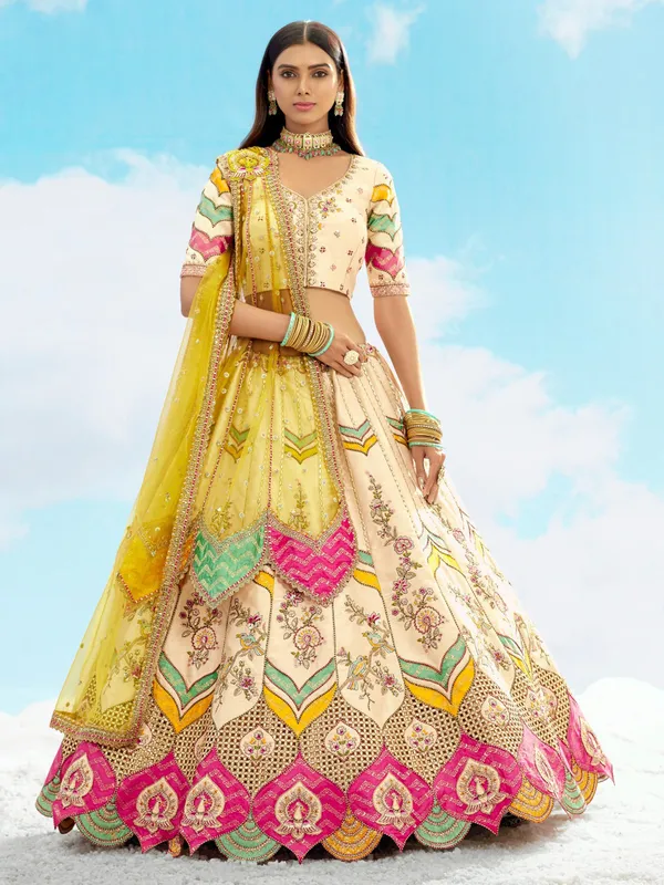 Silk cream lehenga choli with net dupatta