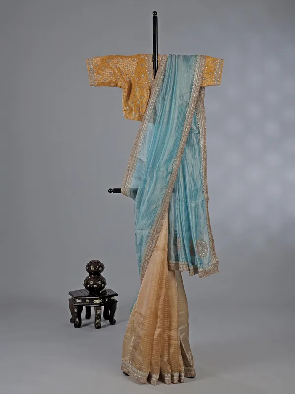 Sky blue and beige organza saree with zari work