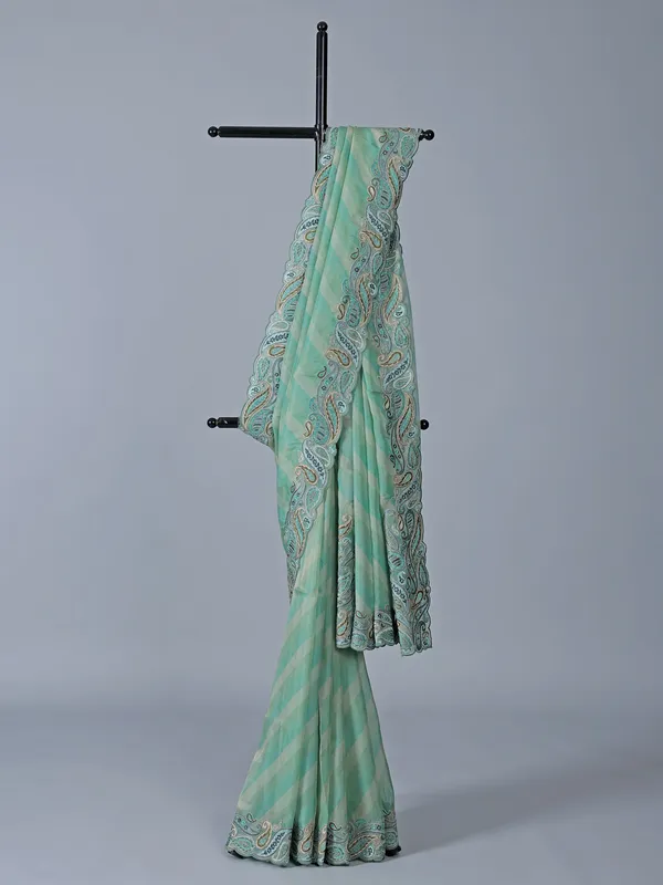 Sky blue silk printed embroidered saree unstitched