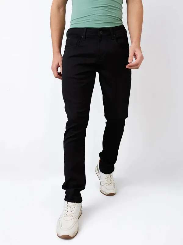 SPYKAR solid black skinny fit jeans for men