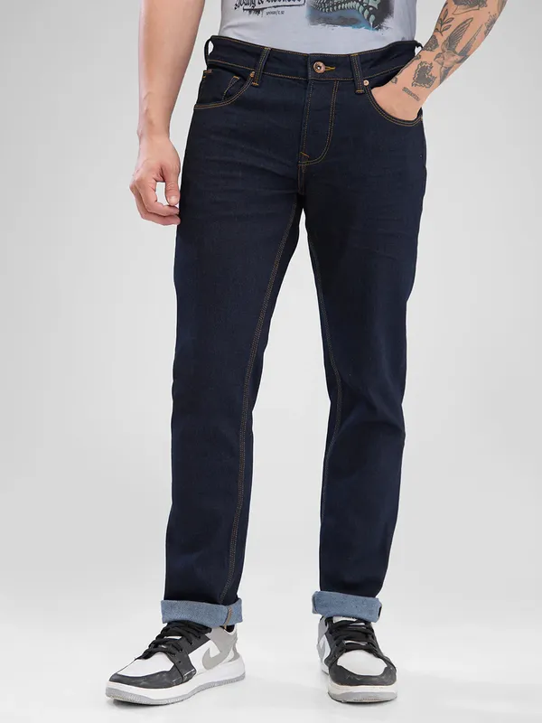 SPYKAR solid navy slim fit denim for men