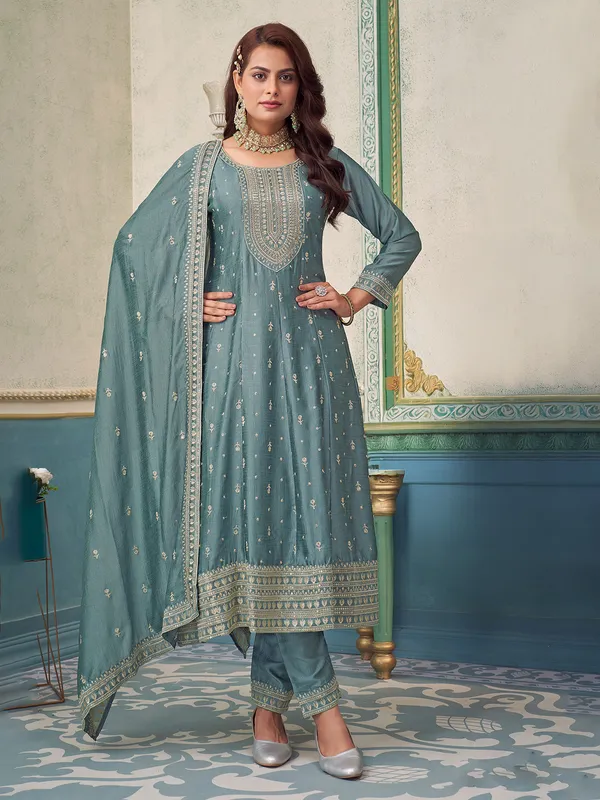 Stone green silk suit with quarter sleeves and dupatta