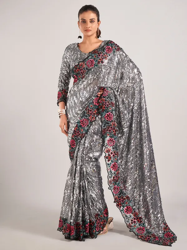 Stunning black net with sequins saree
