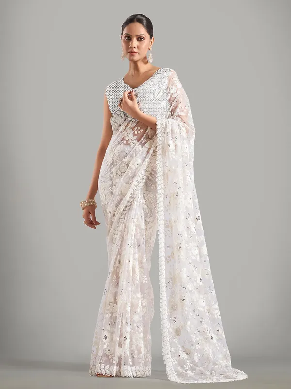 Stunning cream net saree for reception