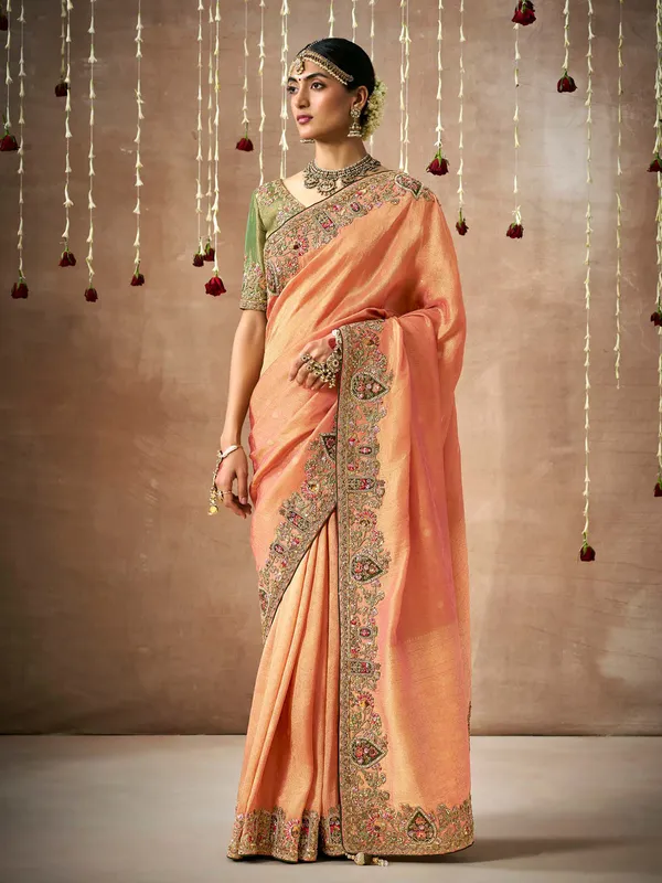 Stunning dola silk saree in peach