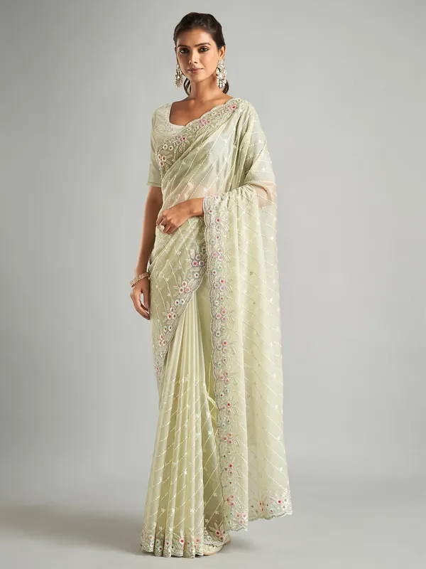 Stunning light green organza saree