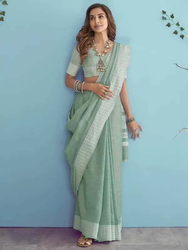 Stunning mint green linen saree