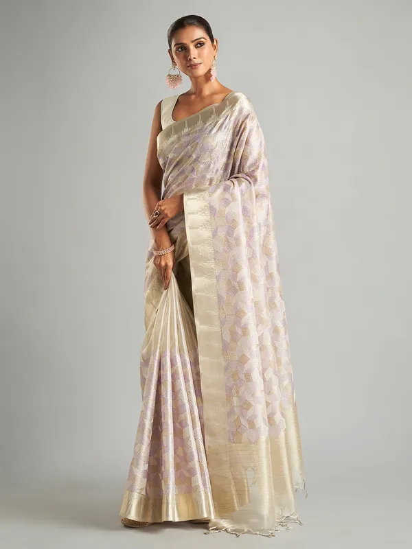 Stunning off-white tissue silk saree