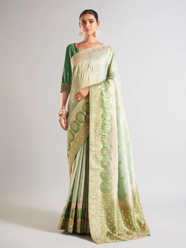 Stunning pista green silk saree for festive