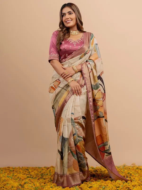 Stunning purple and beige dola silk saree