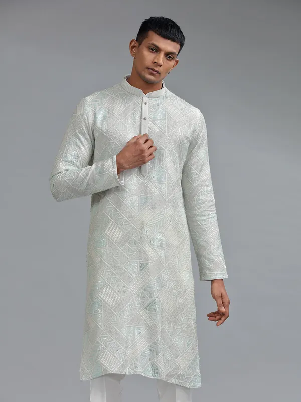 Stunning sea green silk kurta suit