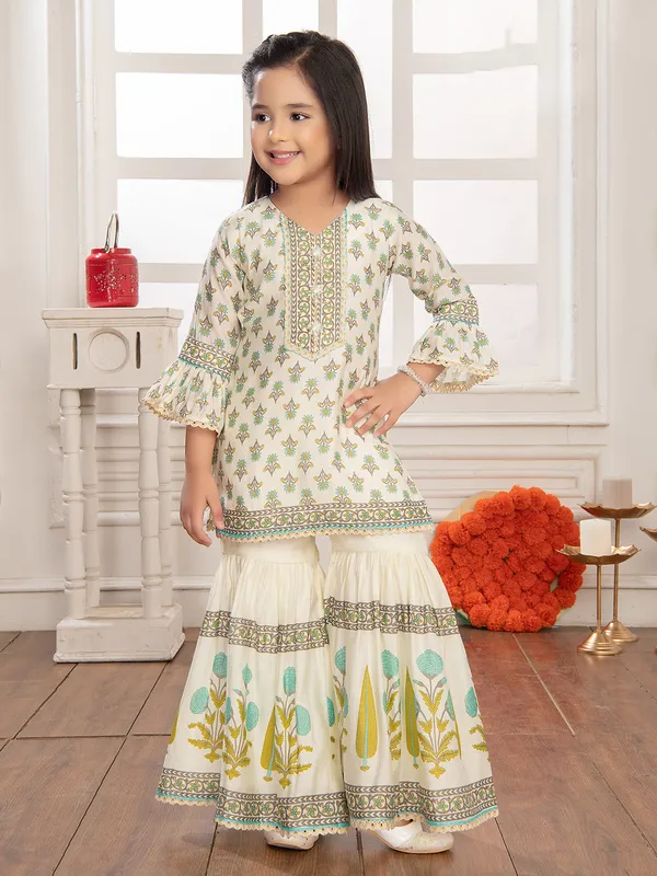 Stunning white and green printed sharara suit